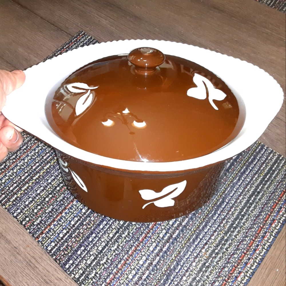 Brown and white ceramic casserole dish with lid